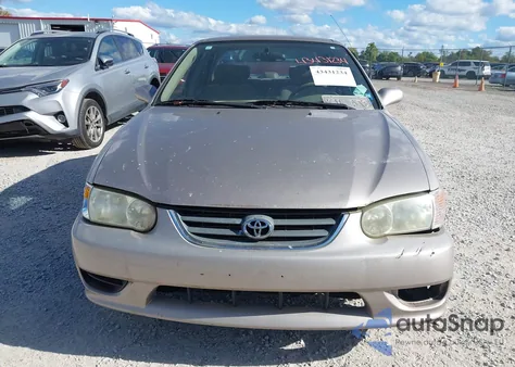 2001 Toyota Corolla Le z USA, uszkodzony, nr VIN 2T1BR18E41C473850